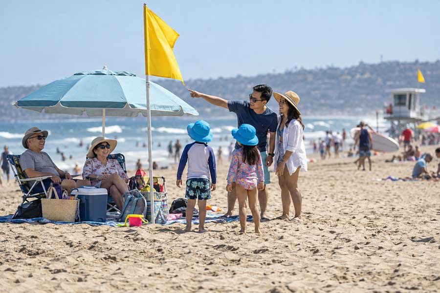 A family enjoying a day at the beach together