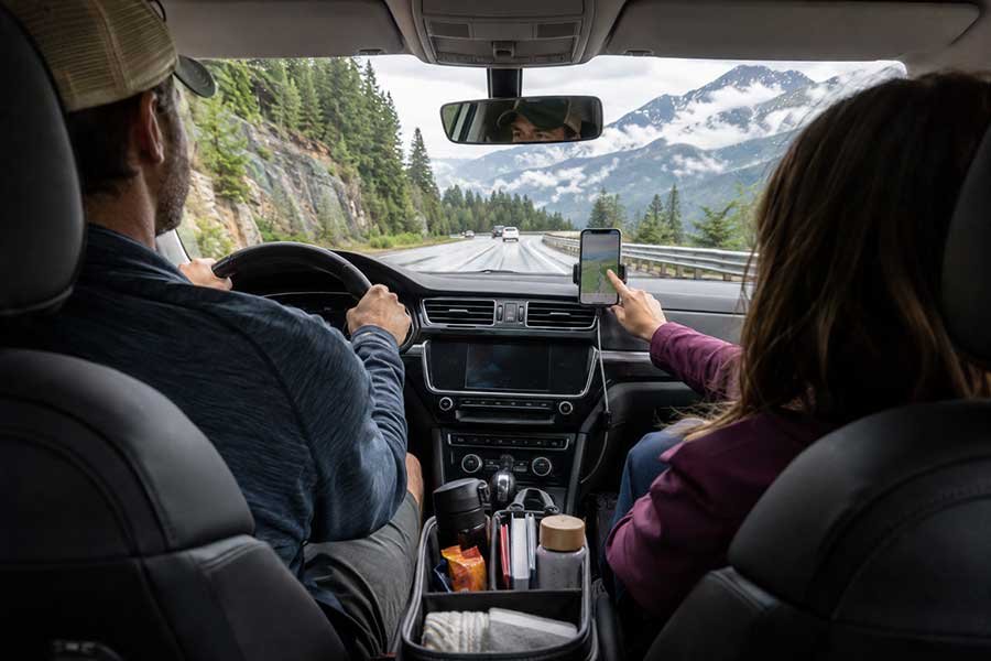 A cooler packed with road trip snacks and drinks