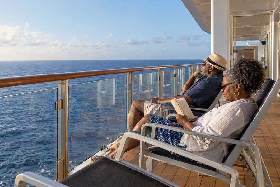 Quiet morning on a cruise ship deck with calm sea and soft sunrise light